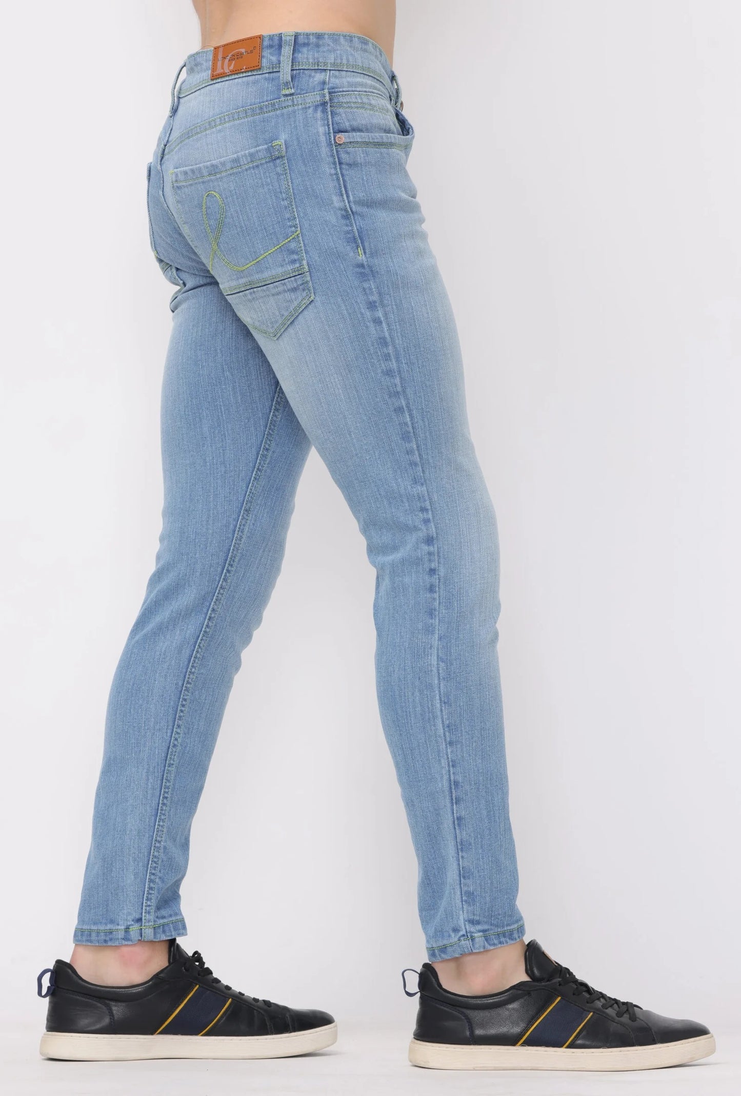 Indigo light wash with neon green thread Ankle fit Jeans